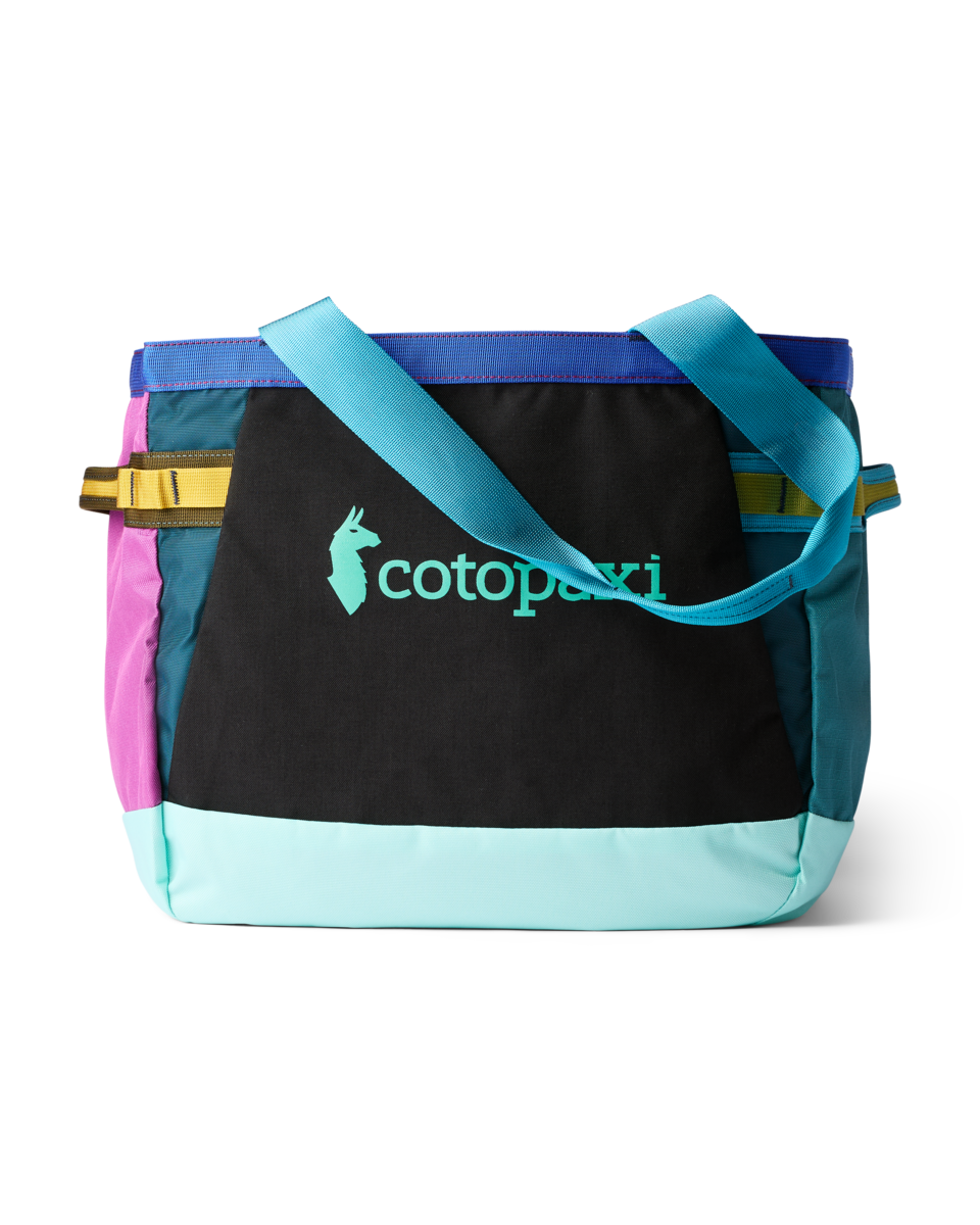 Multicolored tote bag with black front panel, colorful side panels, and teal shoulder straps