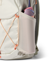 Light gray daypack with orange bungee cord system and side water bottle pocket, detail view