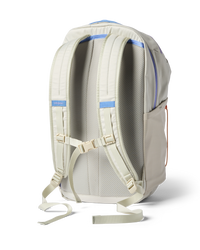 Light colored daypack backpack shown from back view displaying padded shoulder straps and chest strap