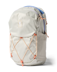 Light gray daypack with orange bungee cord system and padded shoulder straps, side view