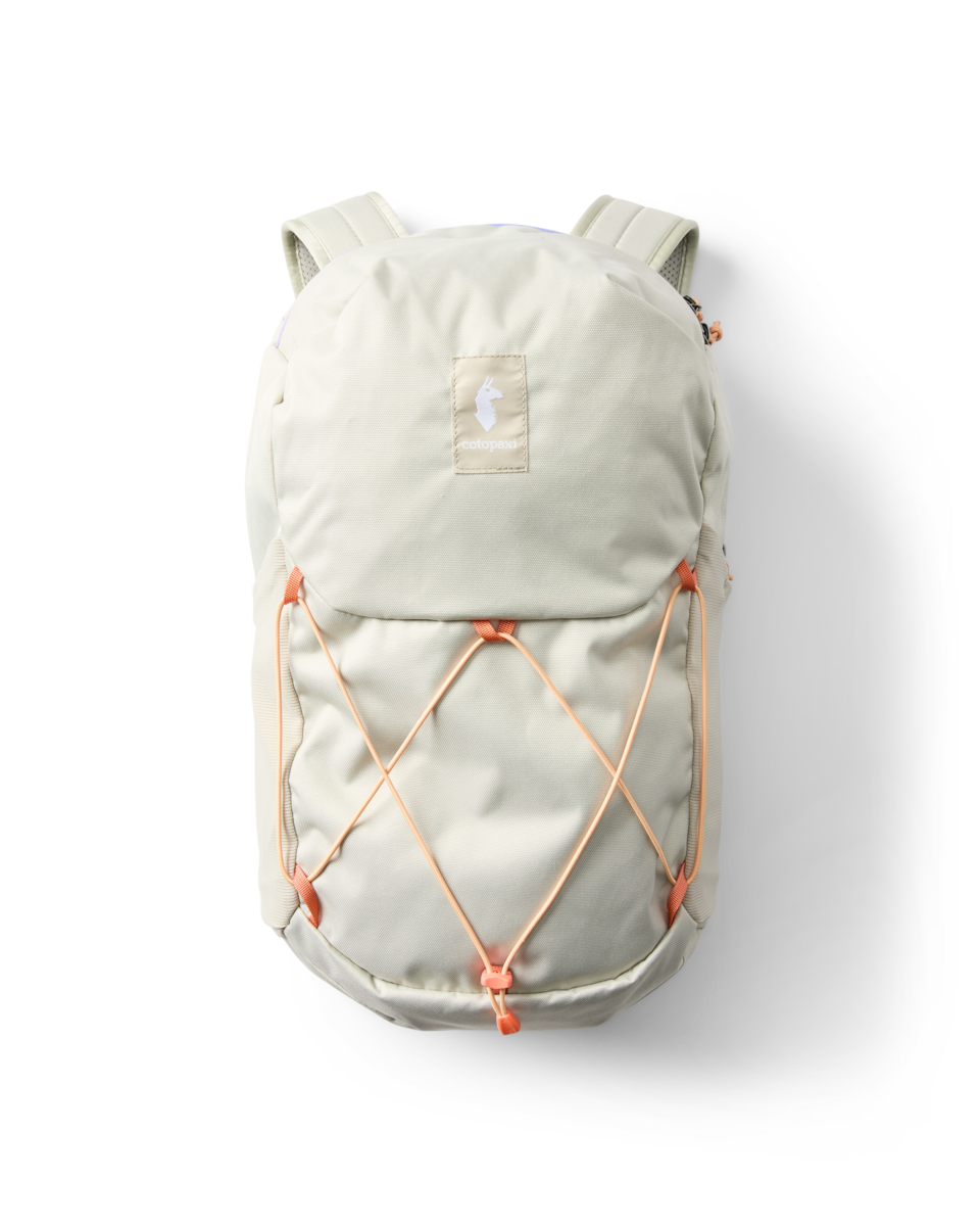 Light green hiking backpack with orange cord details and clean studio background