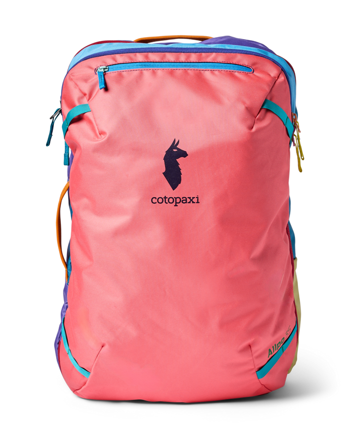 Coral pink travel backpack with colorful accent panels and front zip pocket
