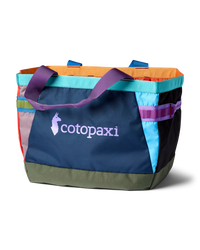 Large tote bag with colorful patchwork design featuring multiple fabric panels and shoulder straps