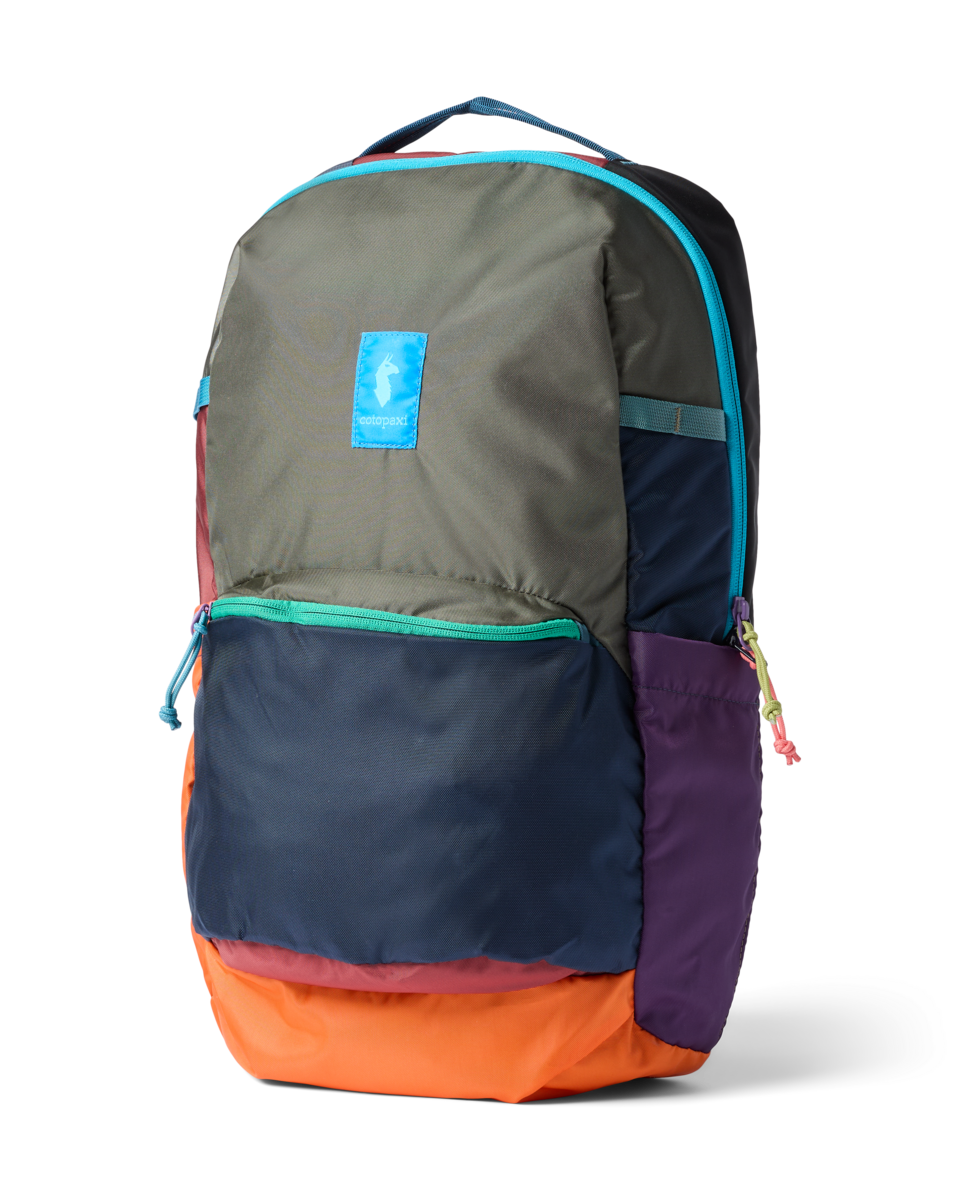 Colorblock backpack with multiple compartments, bright zipper accents, and logo patch, angled view