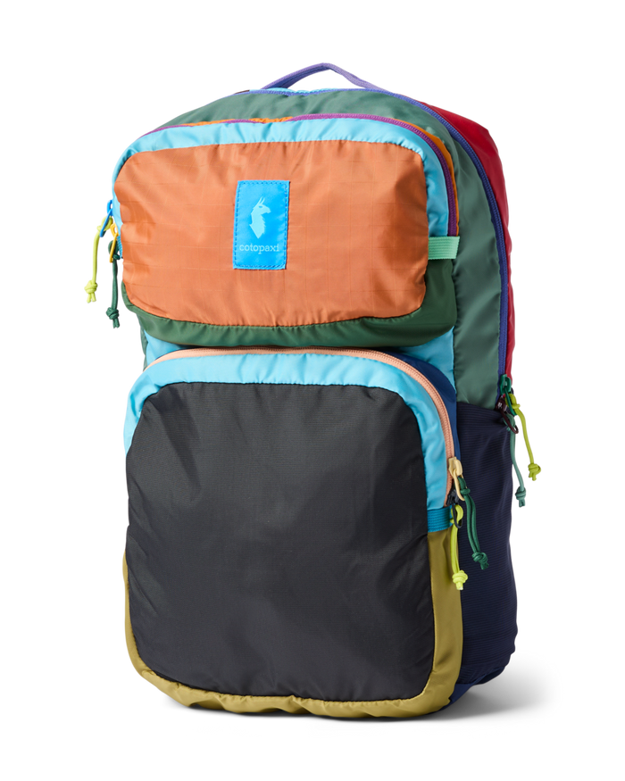 Colorful multicolor backpack with multiple compartments and zippers, front three-quarter view