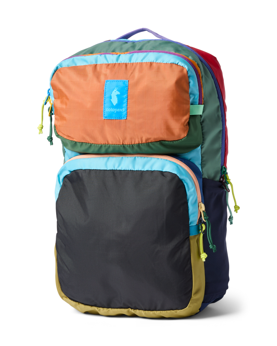 Colorful multicolor backpack with multiple compartments and zippers, front three-quarter view