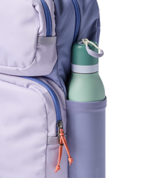 Light purple backpack with blue accents, side view showing water bottle in mesh pocket