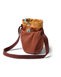 Mesh bucket-style water bottle sling with drawstring top, crossbody strap, and teal accent pulls