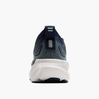 Navy blue running shoe with mesh upper and white sole, rear heel view
