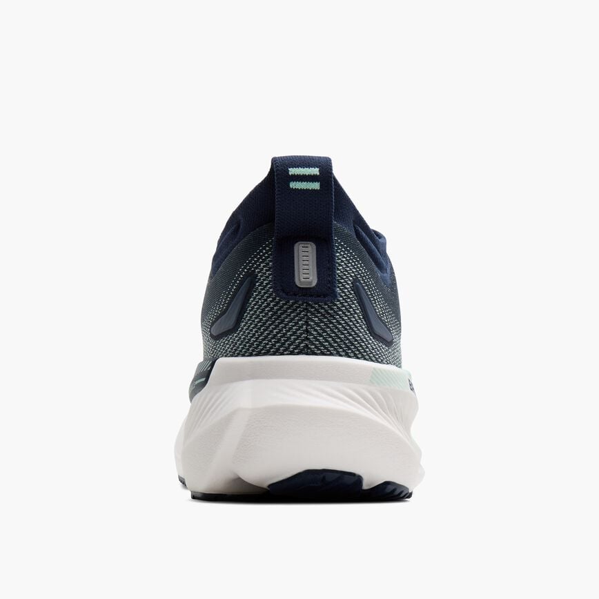 Navy blue running shoe with mesh upper and white sole, rear heel view