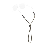 Brown rope eyewear retainer with adjustable slider and black end tips on white background
