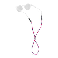 Eyewear retainer strap with pink and blue patterned rope cord attached to clear sunglasses