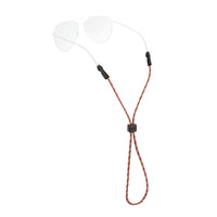 Eyewear retainer with red and white braided cord and clear silicone temple grips