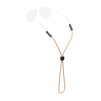 Tan rope eyewear retainer with black end pieces and cord lock on white background