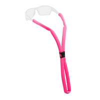 Bright pink floating eyewear retainer strap with black adjustment clip and clear glasses attachment