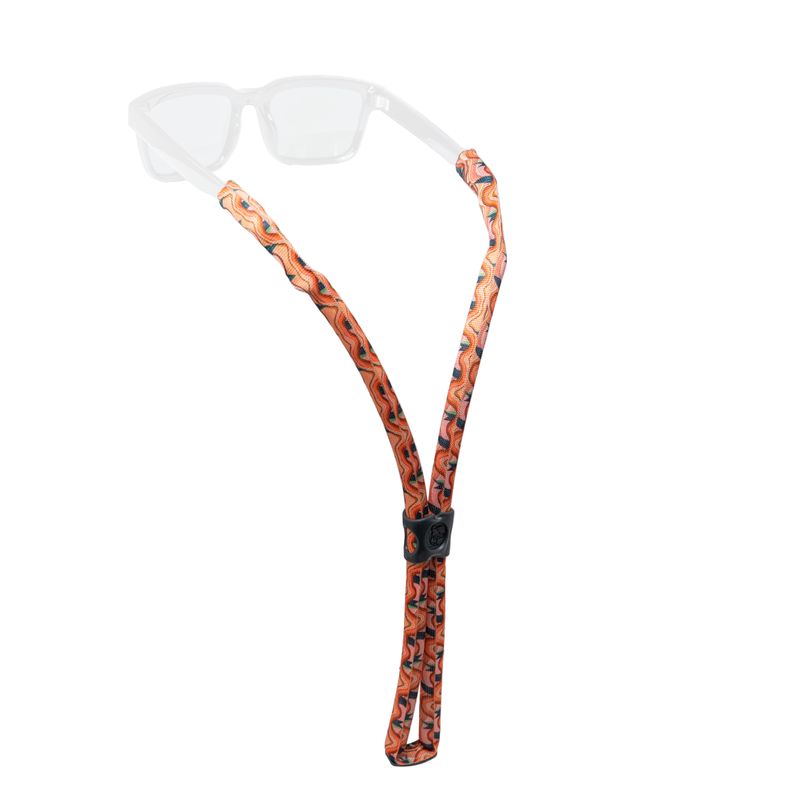 Floating eyewear retainer strap with orange patterned design and adjustment slider