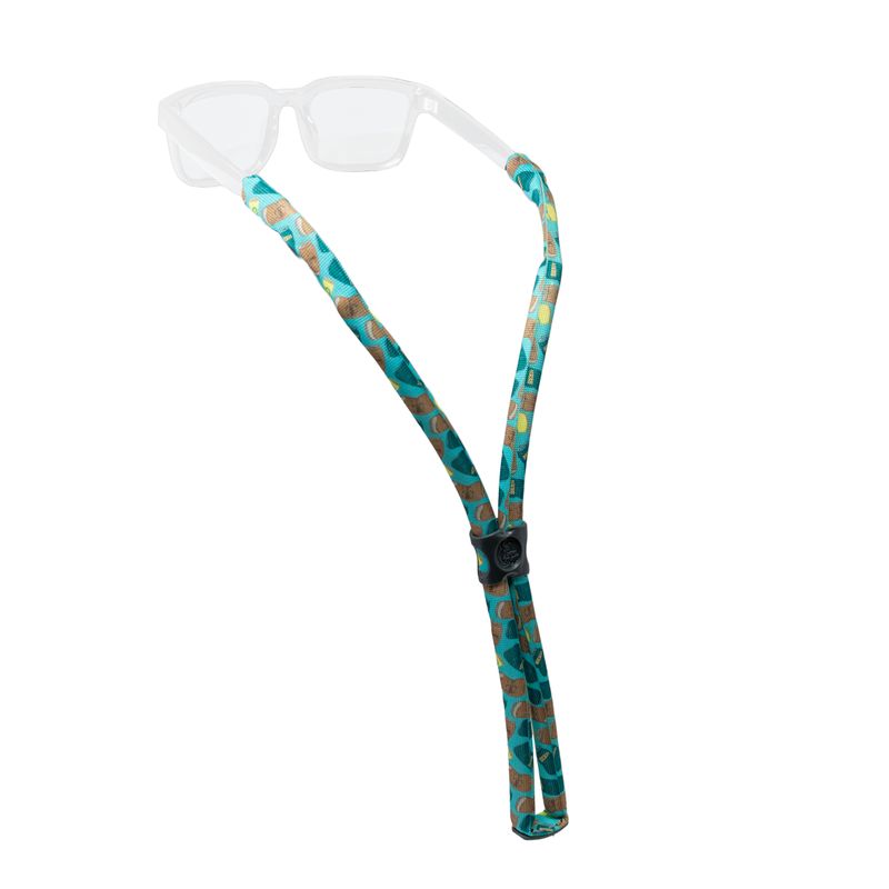 Floating eyewear retainer with turquoise geometric pattern attached to clear safety glasses