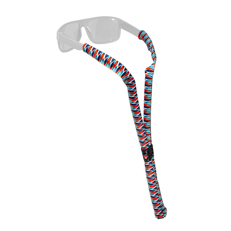 Floating eyewear retainer with red, white and blue striped pattern attached to safety glasses