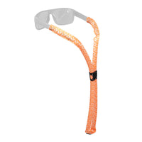 Orange patterned floating eyewear retainer strap with sunglasses attached, shown against white background
