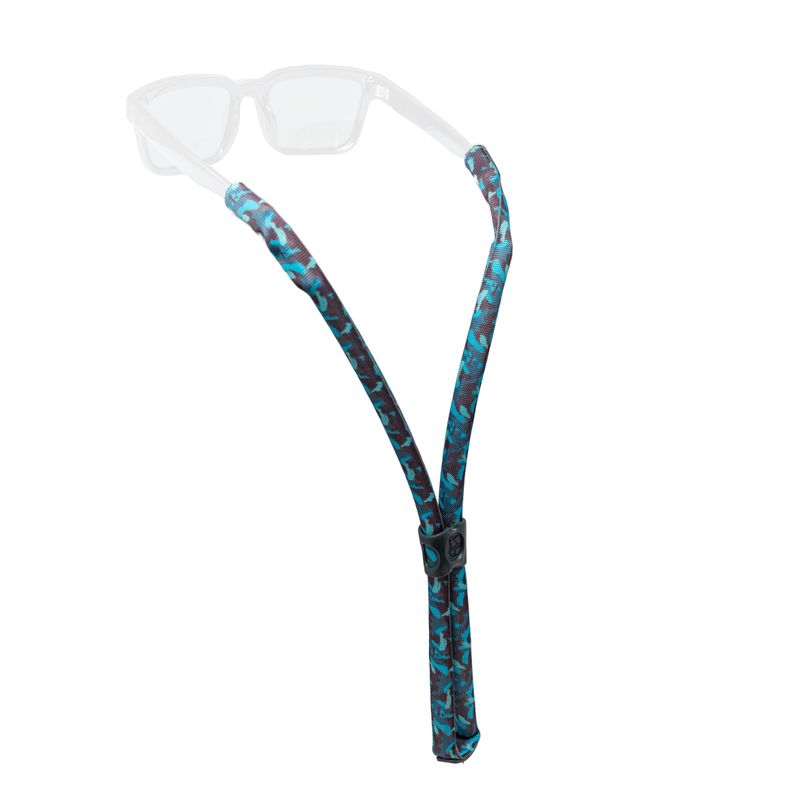 Floating eyewear retainer with teal and black pattern, shown with clear glasses frame
