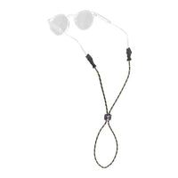 Eyewear retainer strap with braided cord, rubber grips, and adjustable slider attached to clear sunglasses