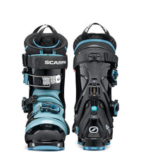 Alpine ski boots shown from front and rear angles, featuring buckle closures and blue accents