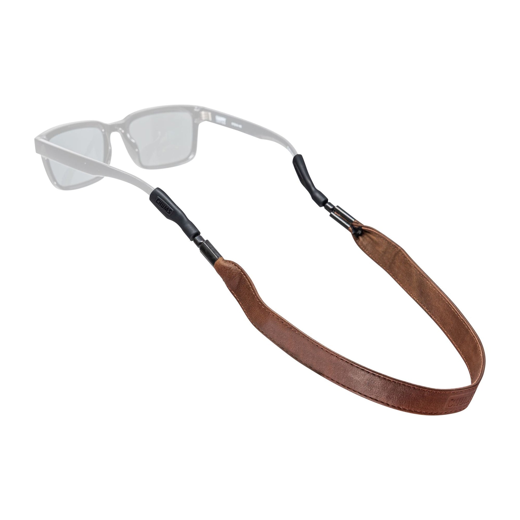 Brown leather eyeglass retainer strap attached to clear glasses on white background