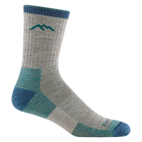 Crew-height hiking sock in oatmeal with teal and blue heel, toe, and cuff accents, side view
