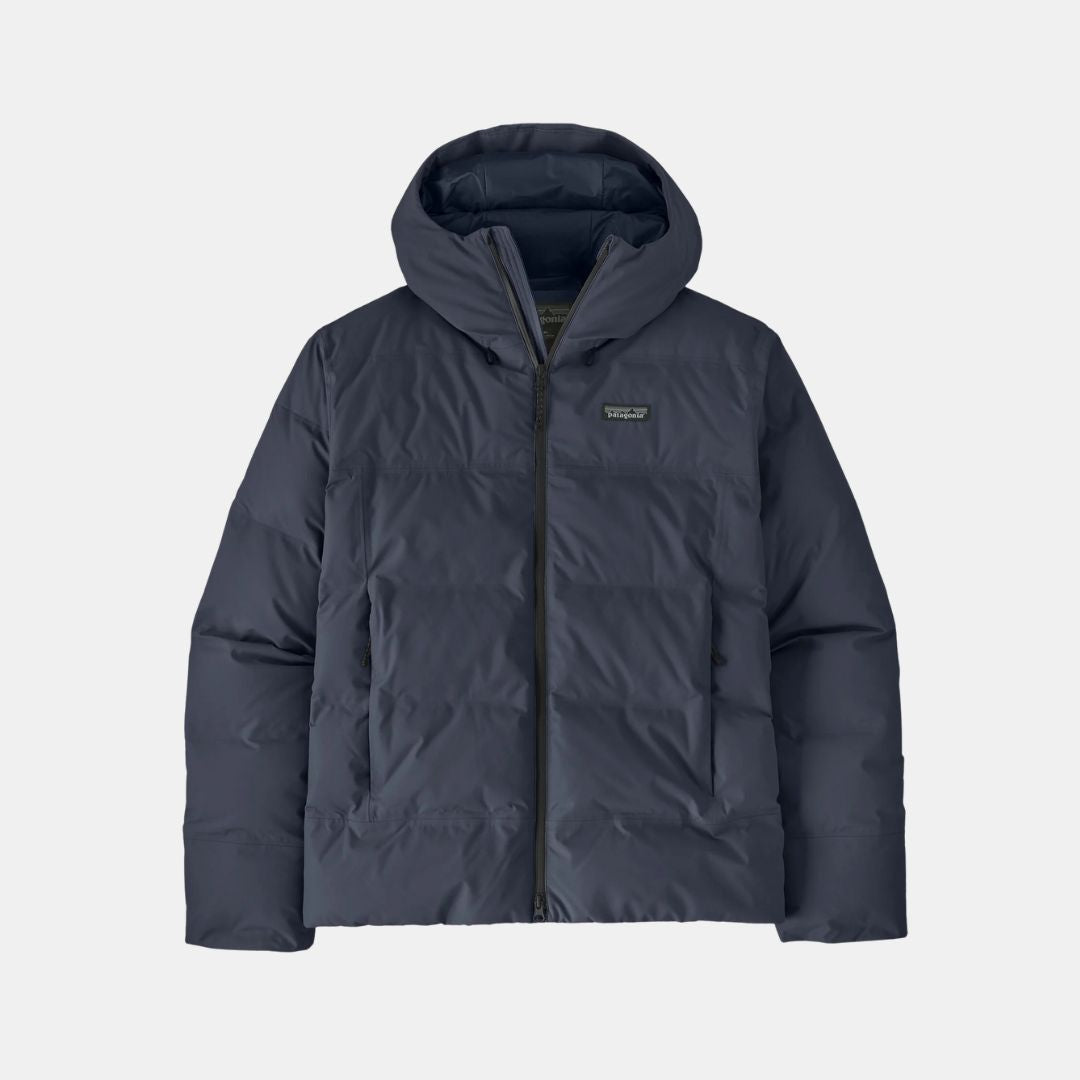 Dark navy hooded puffer jacket with full zip and quilted panels, front view
