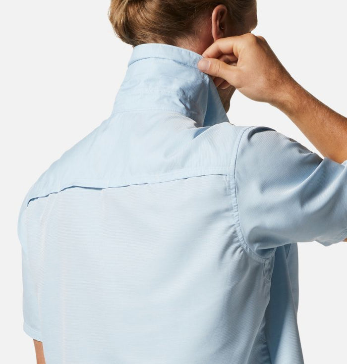 Light blue short sleeve button-up shirt shown from back angle on model