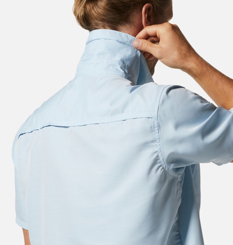 Light blue short sleeve button-up shirt shown from back angle on model