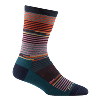Crew-length wool sock with multicolor horizontal stripes on navy and teal base, side view