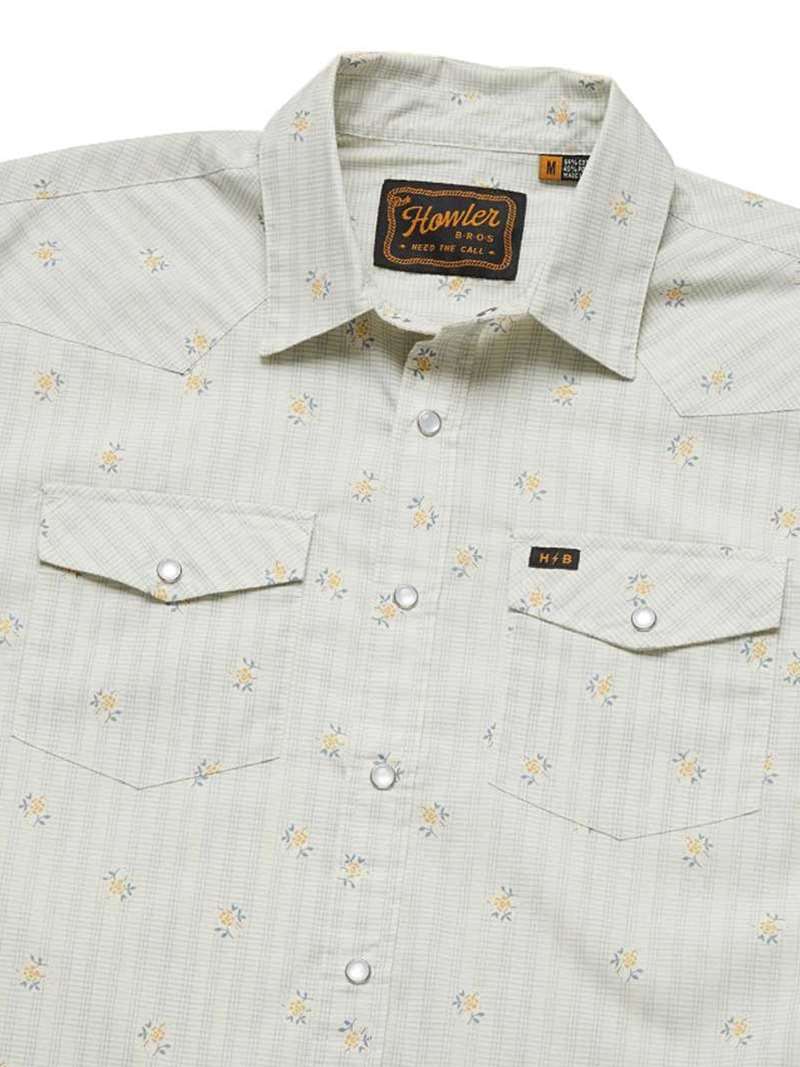 Men's western snap shirt with floral grid pattern, dual chest pockets, and snap buttons, flat lay view