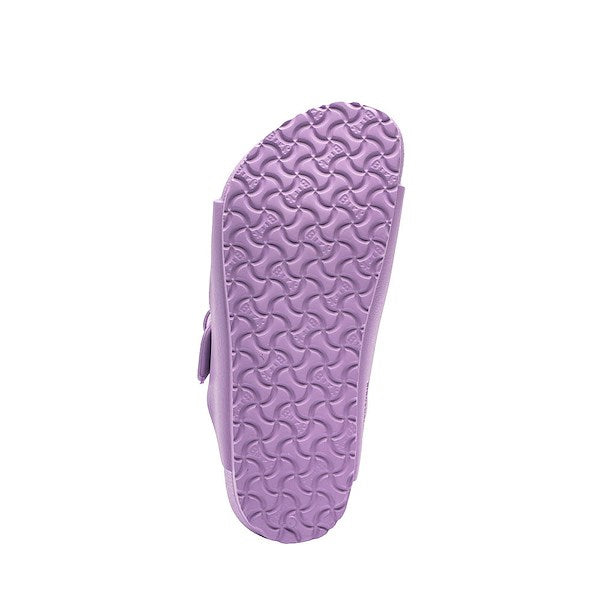 Purple children's sandal sole with textured tread pattern, bottom view
