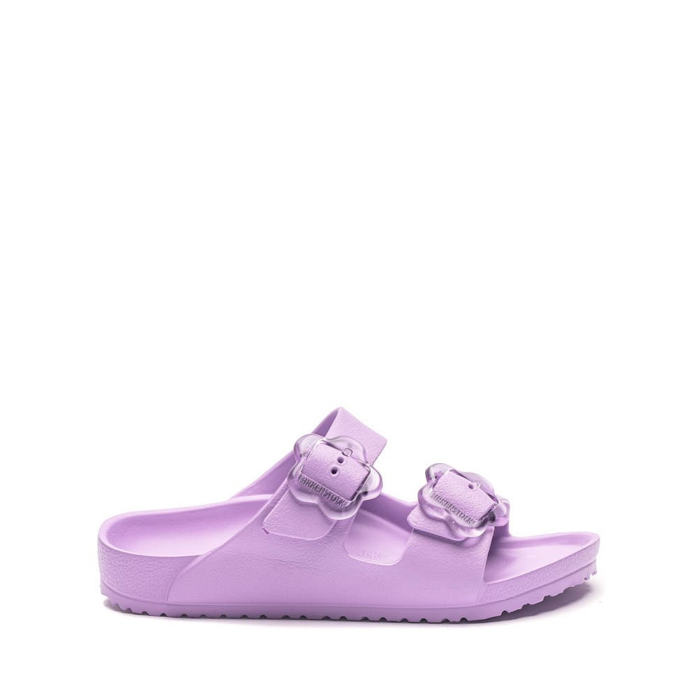 Light purple slip-on sandals with two adjustable buckle straps, side view