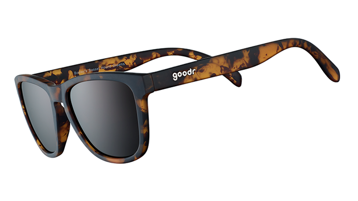 Tortoiseshell patterned sunglasses with dark lenses shown in side angle view