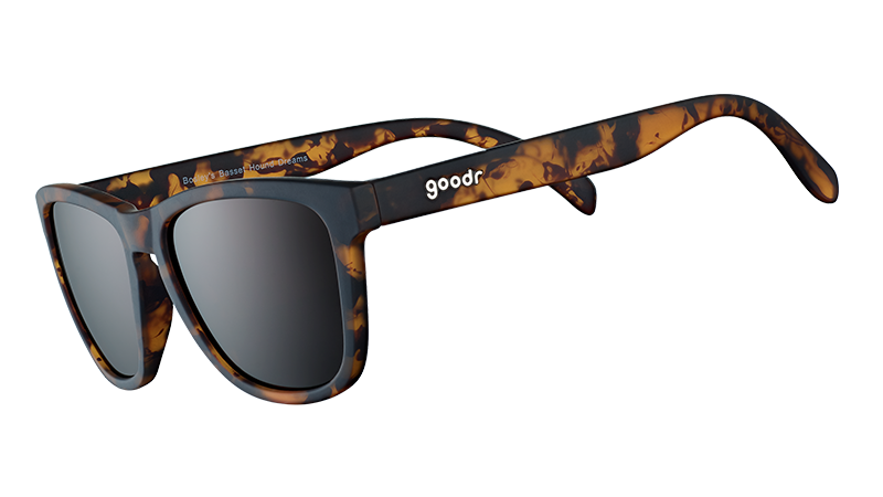Tortoiseshell patterned sunglasses with dark lenses shown in side angle view