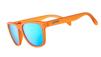 Orange sunglasses with blue mirrored lenses shown from side angle on white background