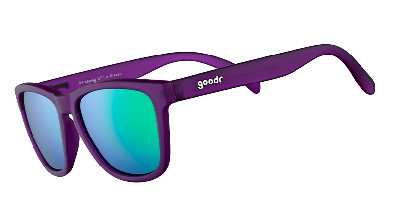 Purple sunglasses with wavy temples and blue-green mirrored lenses, side angle view