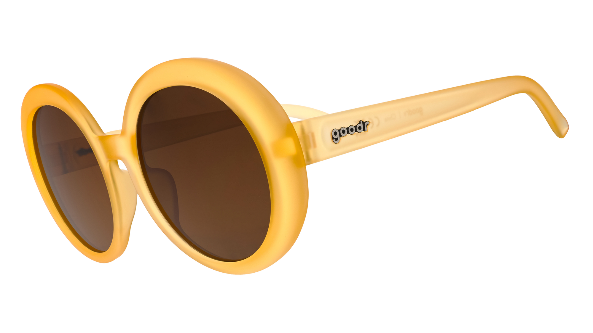 Round oversized sunglasses with golden yellow frames and brown gradient lenses, side angle view