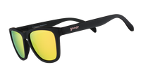 Black framed sunglasses with yellow-green mirrored lenses shown at side angle
