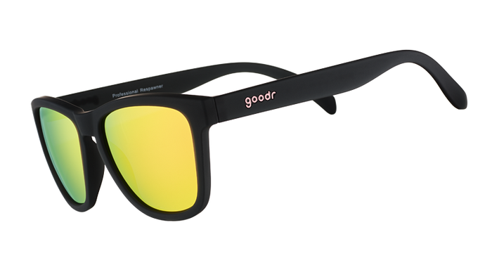 Black framed sunglasses with yellow-green mirrored lenses shown at side angle