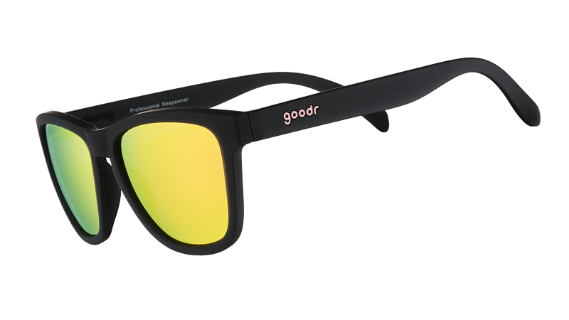 Black framed sunglasses with yellow-green mirrored lenses shown at side angle