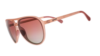 Pink aviator-style sunglasses with gradient lenses shown in side profile view