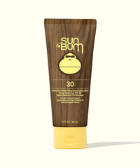Brown wood-grain sunscreen tube with yellow cap and SPF 30 labeling, front view
