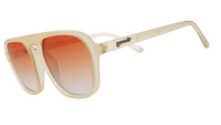 Cream-colored sunglasses with orange gradient lenses shown at three-quarter angle