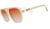Cream-colored sunglasses with orange gradient lenses shown at three-quarter angle