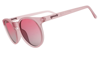 Round translucent pink sunglasses with gradient lenses shown at three-quarter angle