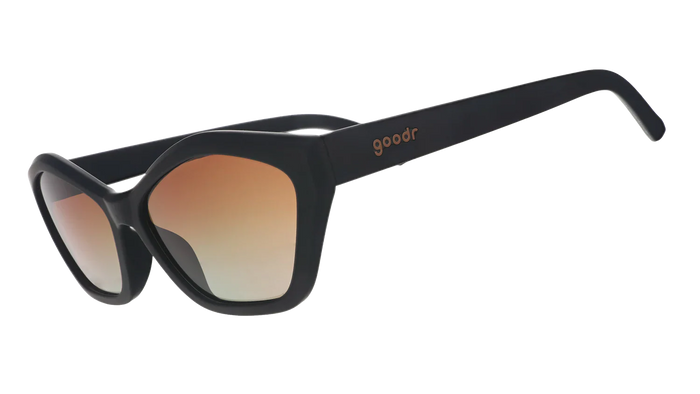 Black framed sunglasses with gradient brown lenses shown from side angle