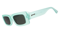 Mint green rectangular sunglasses with dark lenses shown in side profile view